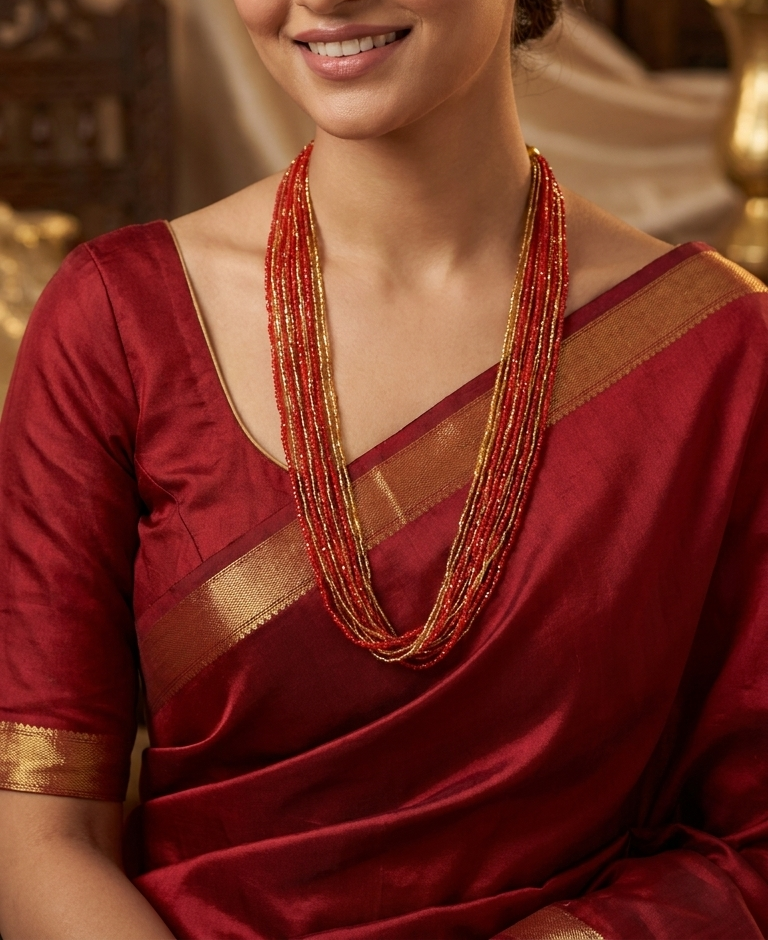 Red and gold multi-strand glass seed bead potey necklace on display bust — Behuli Australia — view 2