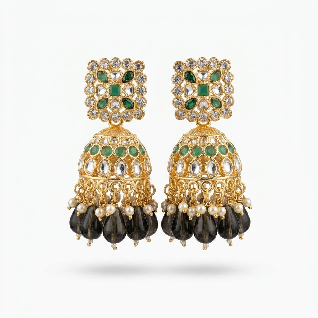 Gold-plated Kundan jhumka earrings with emerald green stones, smoky black teardrop beads and ivory pearl drops — Behuli