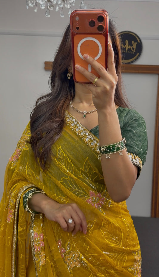 Mustard yellow saree with floral embroidery and sequin border worn with a green embellished blouse — Behuli Australia — view 2