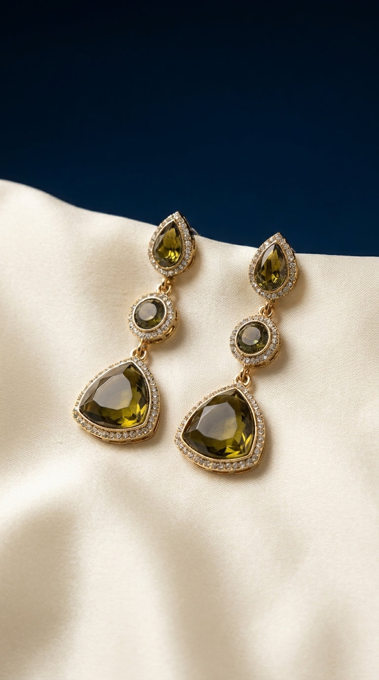 Olive green three-tier drop earrings with crystal rhinestone halo and gold-tone setting on ivory silk — Behuli Australia