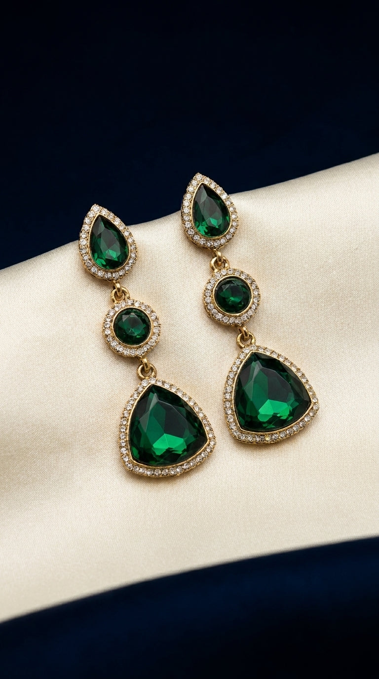 Emerald green three-tier drop earrings with faceted stones and crystal halo in gold-tone setting — Behuli Australia