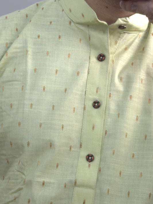 Pista green men's kurti with mandarin collar, printed motifs and button placket paired with white pants — view 2