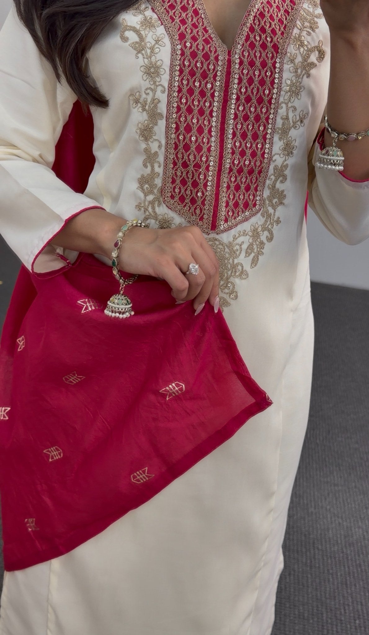 Ivory kurti set with gold zari and resham embroidered neckline, matching palazzo and fuchsia dupatta with gold motifs — — view 4