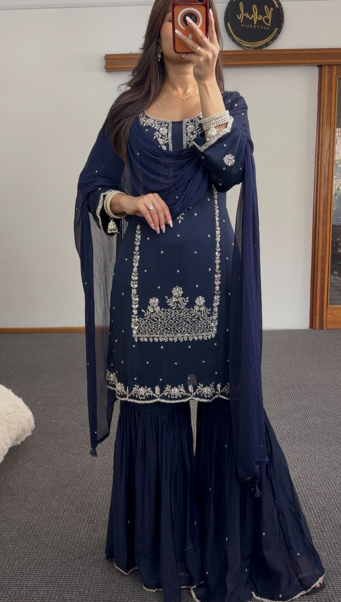 Navy blue sharara set with silver zari thread embroidery on kurta bodice and scalloped hem, matching sharara bottoms — — view 4
