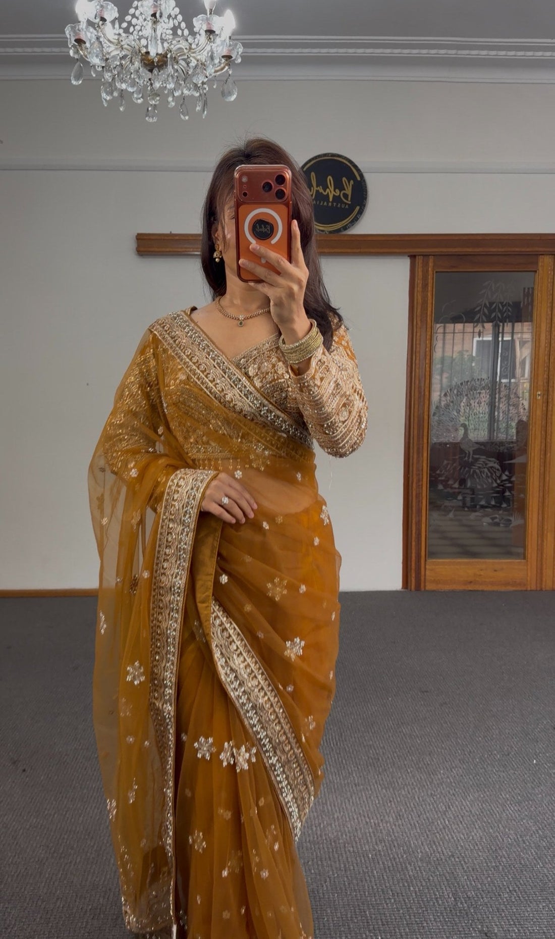 Mustard organza saree with zari and sequin embroidery for a South Asian fabric guide