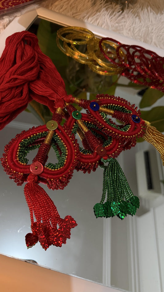 Handcrafted crimson red and emerald green beaded Lachha Dori with gold zari wrapping and sequin tassels — Behuli Australia