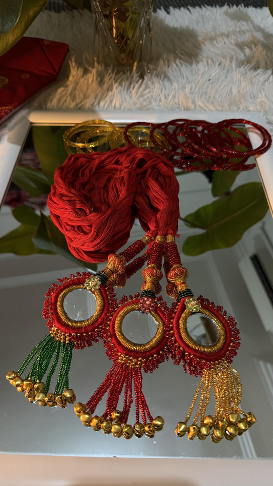Red handcrafted Lachha Dori with circular mirror medallions, gold zari wrapping, seed bead tassels and ghungroo bells — — view 2