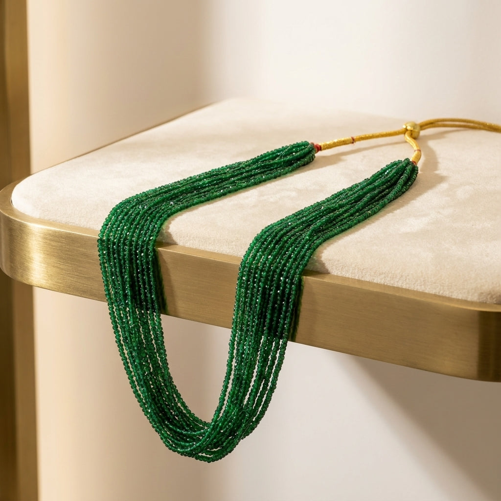 Emerald green multi-strand faceted glass bead potey necklace with gold-plated clasp and red thread accent — Behuli Australia