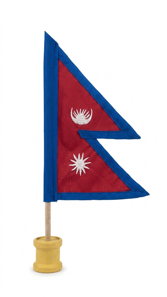 Miniature Nepal national flag on wooden stand with crimson red field, royal blue border and white embroidered moon and sun —