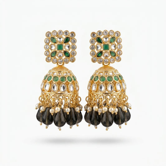 Gold-plated Kundan jhumka earrings with emerald green stones, smoky black teardrop beads and ivory pearl drops — Behuli
