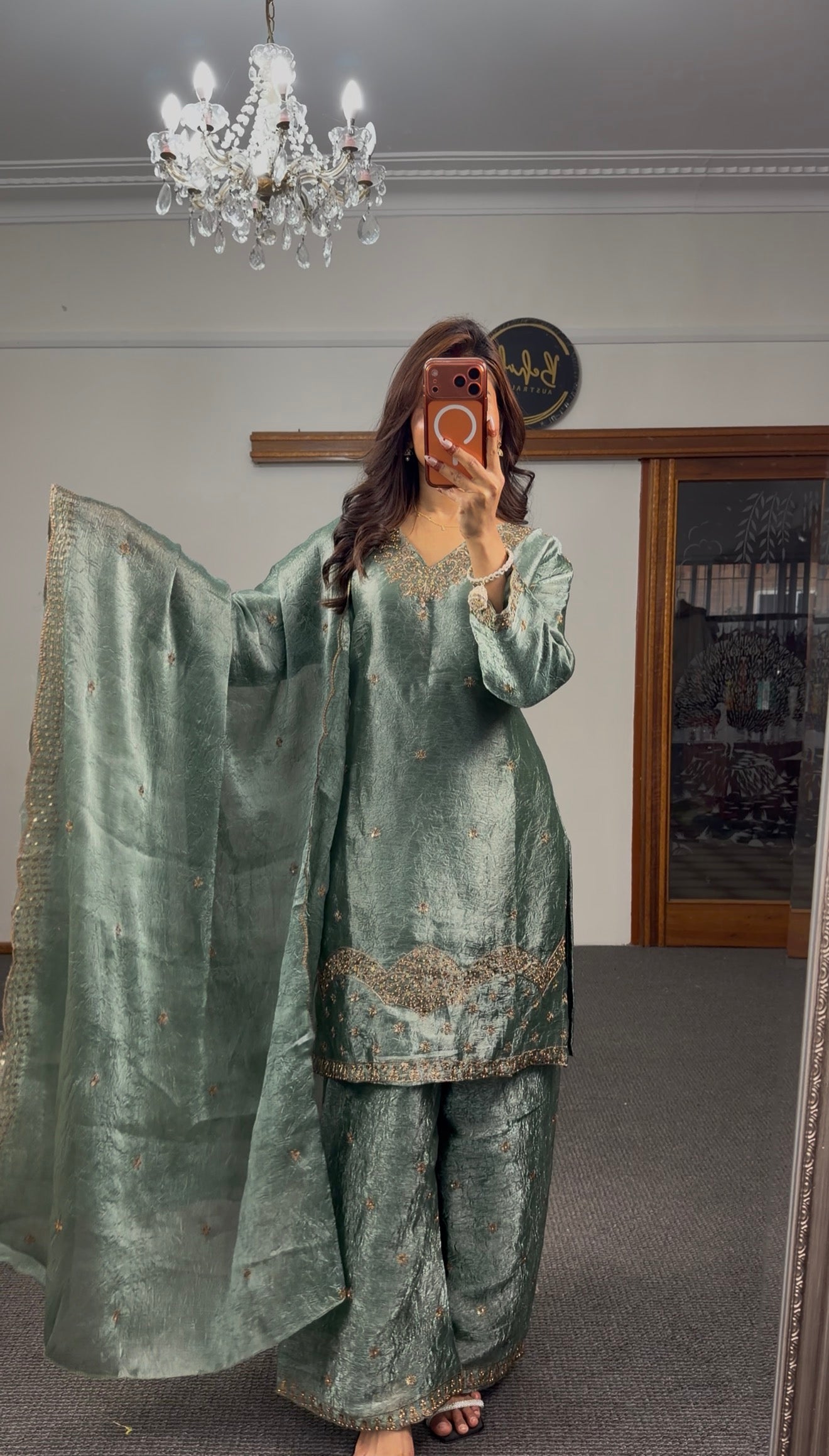 Sage green crushed silk three-piece palazzo kurti set with gold zari embroidery hem band and matching sequin dupatta — — view 3