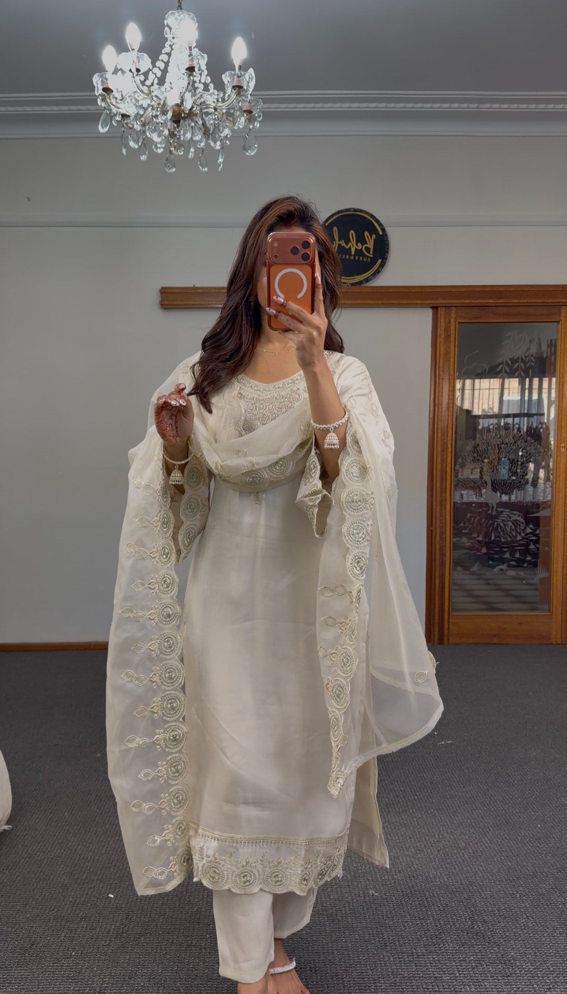 Ivory organza kurti set with gold zari scalloped embroidery and sheer dupatta displayed in mirror selfie — Behuli Australia — view 4