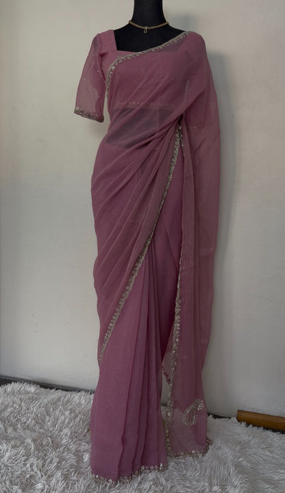 Dusty rose mauve organza saree with silver zari floral embroidery border and matching embroidered blouse on mannequin — — view 2