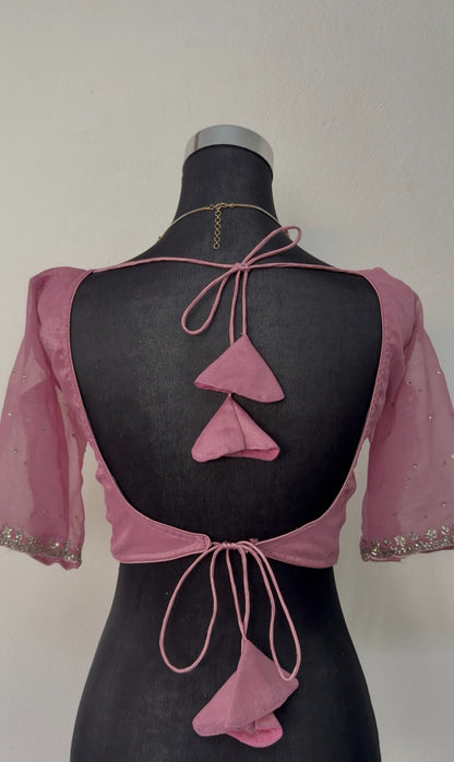 Dusty rose mauve organza saree with silver zari floral embroidery border and matching embroidered blouse on mannequin — — view 5