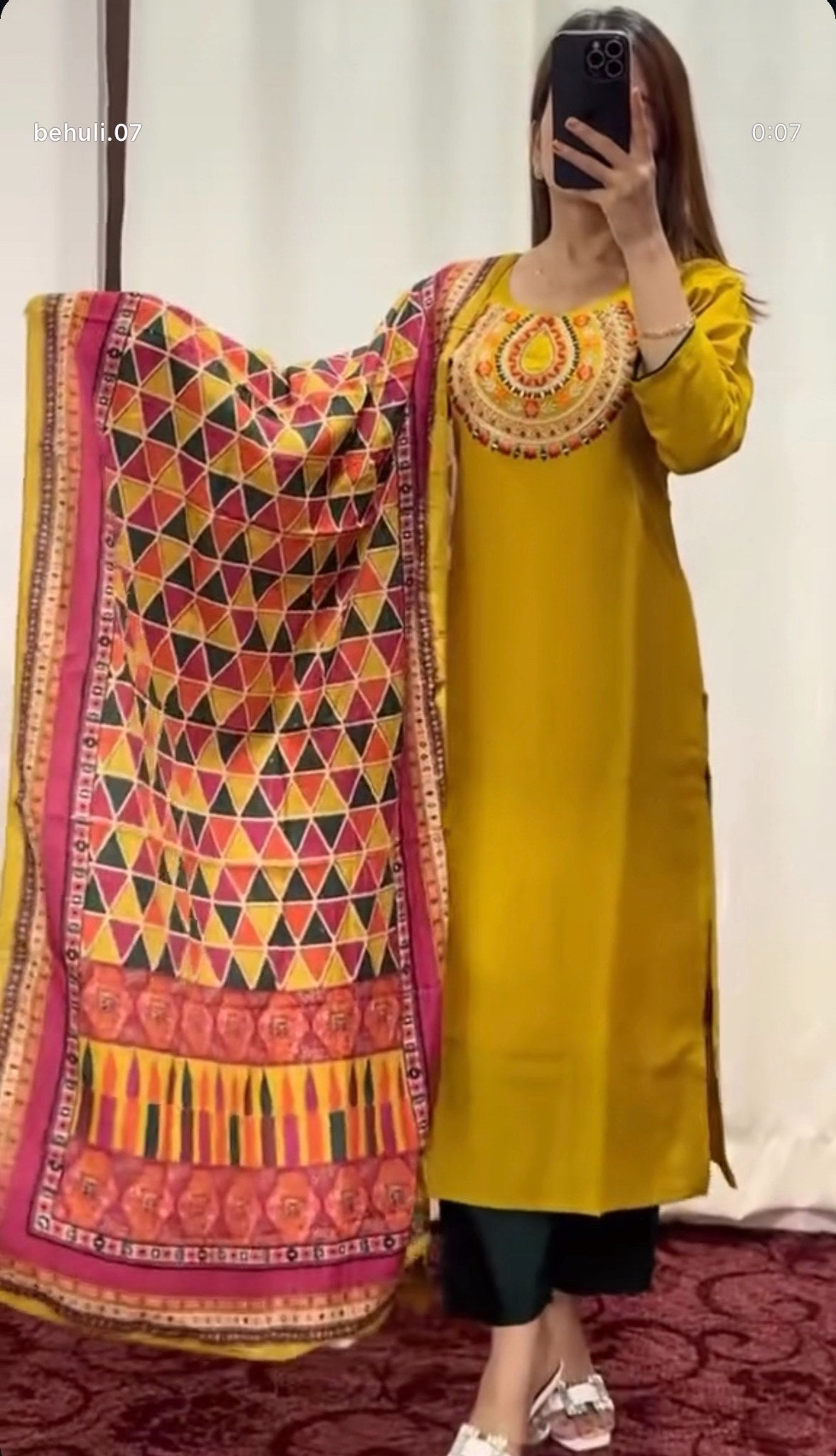 Mustard silk kurti set with resham beadwork neckline, teal palazzo pants and multicolour geometric tribal print dupatta —