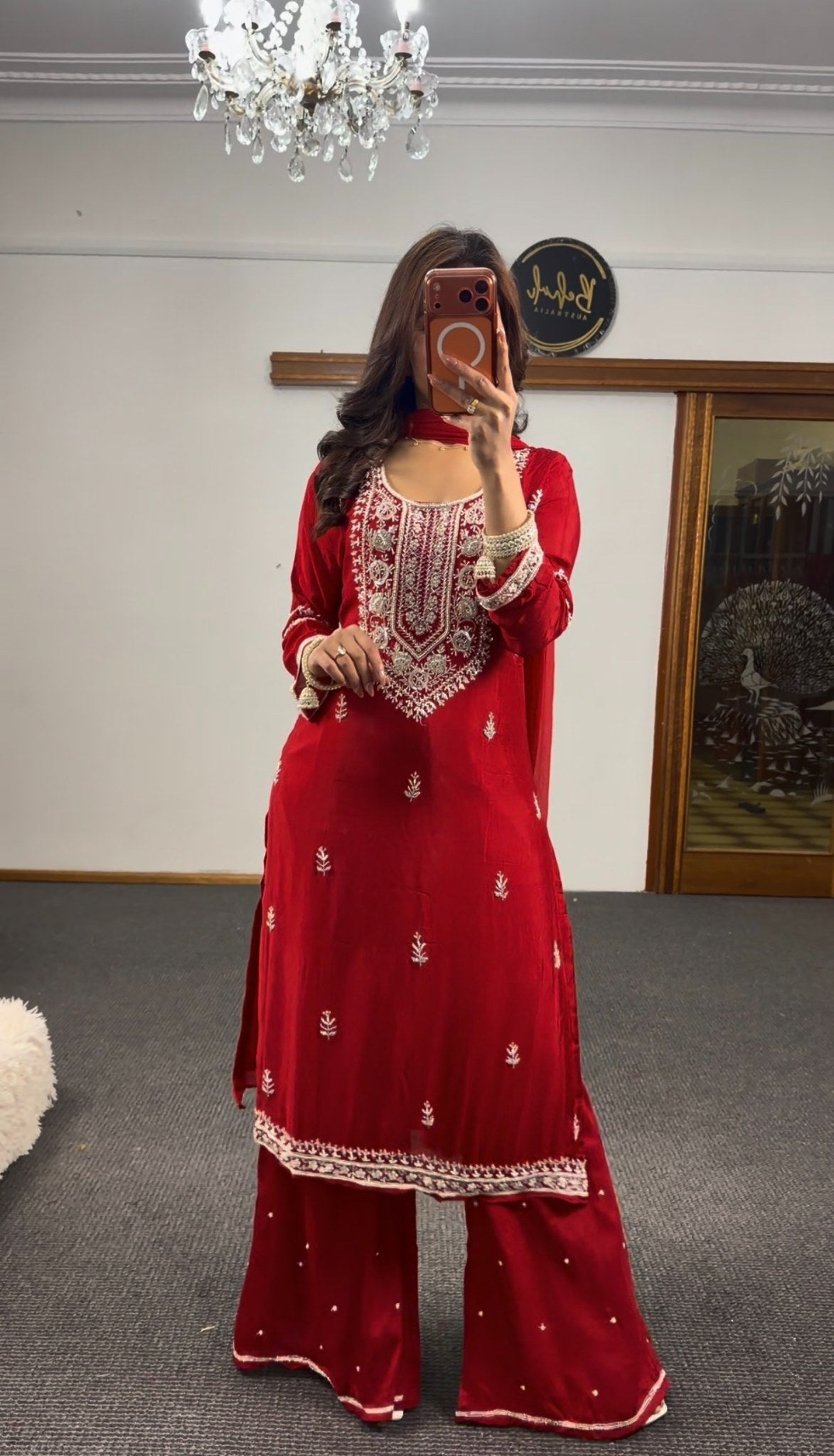 Crimson georgette palazzo suit set with silver zari and resham embroidery on yoke and hem, worn with matching dupatta —