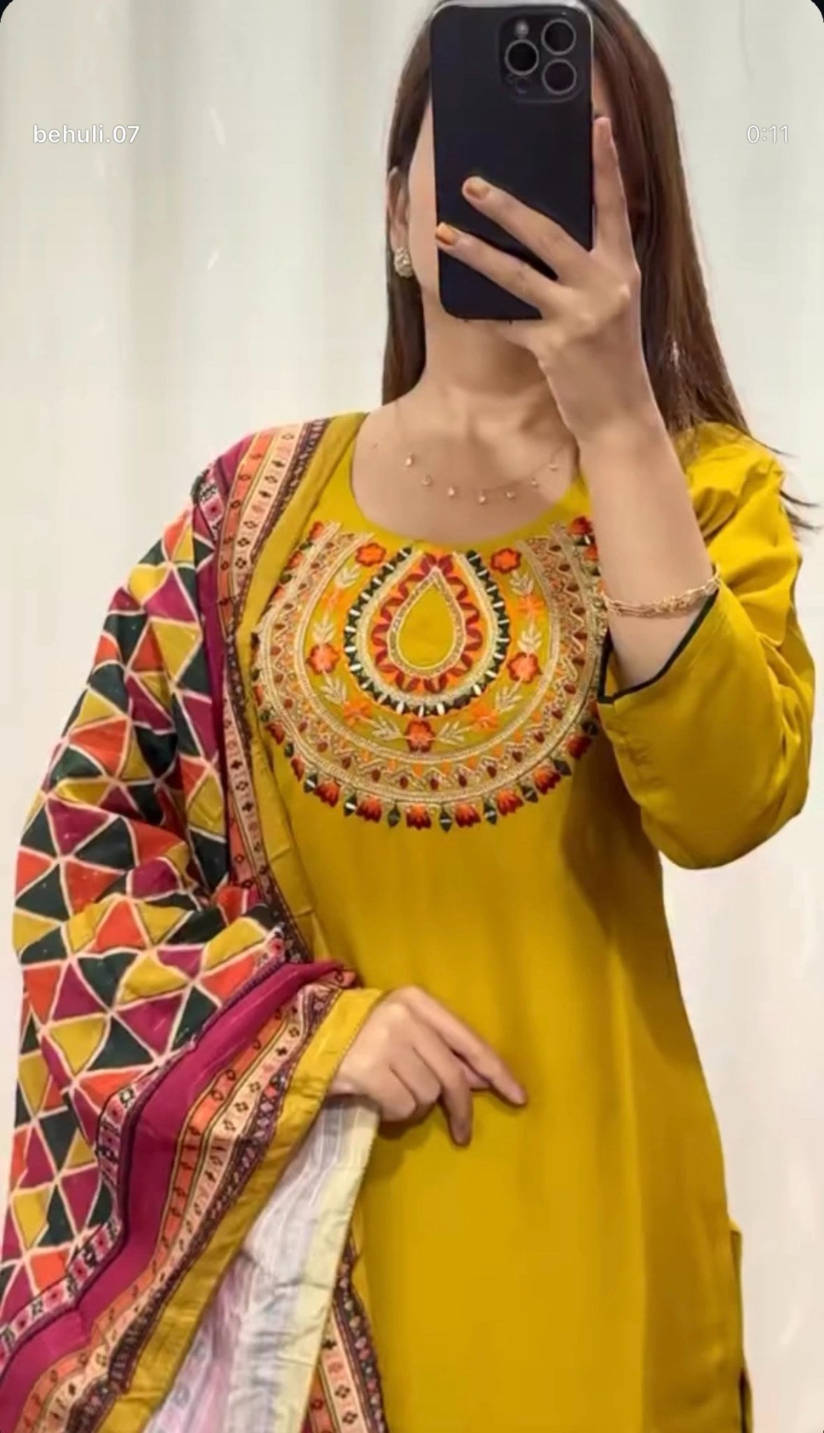Mustard silk kurti set with resham beadwork neckline, teal palazzo pants and multicolour geometric tribal print dupatta — — view 2