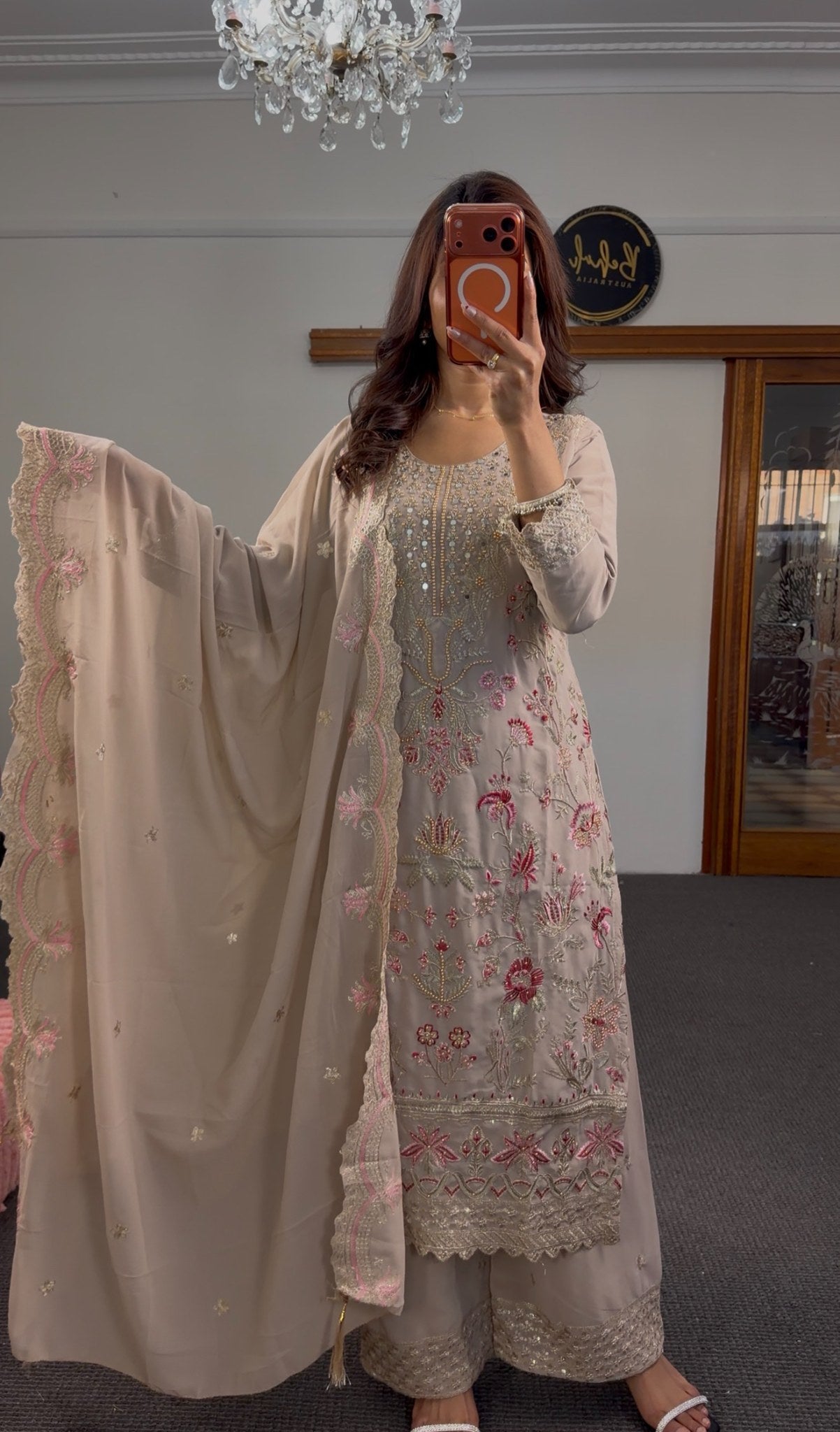 Beige georgette palazzo suit set with fuchsia resham floral embroidery, bead detailing and matching scallop-edge dupatta —