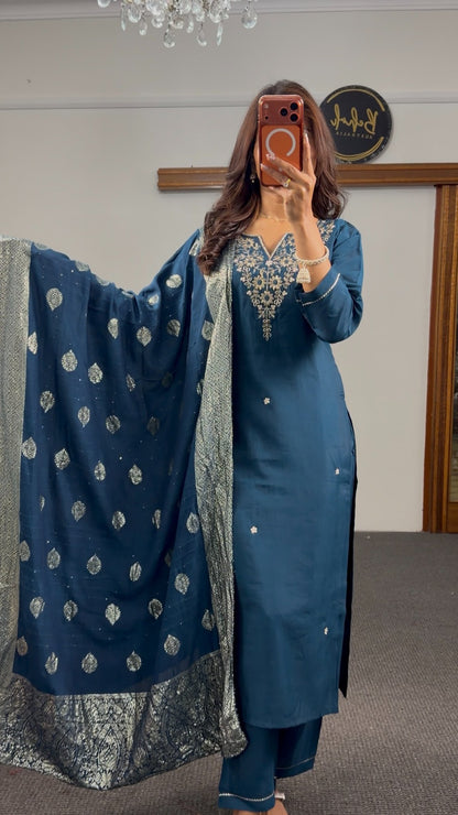 Teal raw silk kurti set with silver zari embroidery at neckline and woven Banarasi dupatta with gold buti motifs — Behuli — view 2