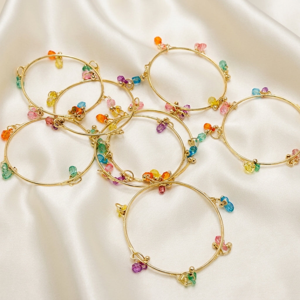 Set of 4 gold-tone wire bangles with multicolour rainbow crystal bead clusters — Behuli Australia