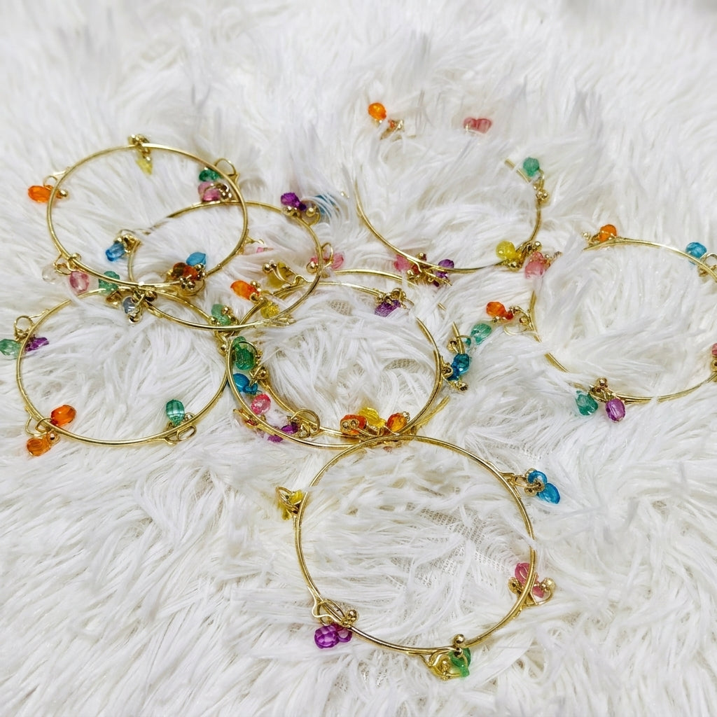 Set of 4 gold-tone wire bangles with multicolour rainbow crystal bead clusters — Behuli Australia — view 2