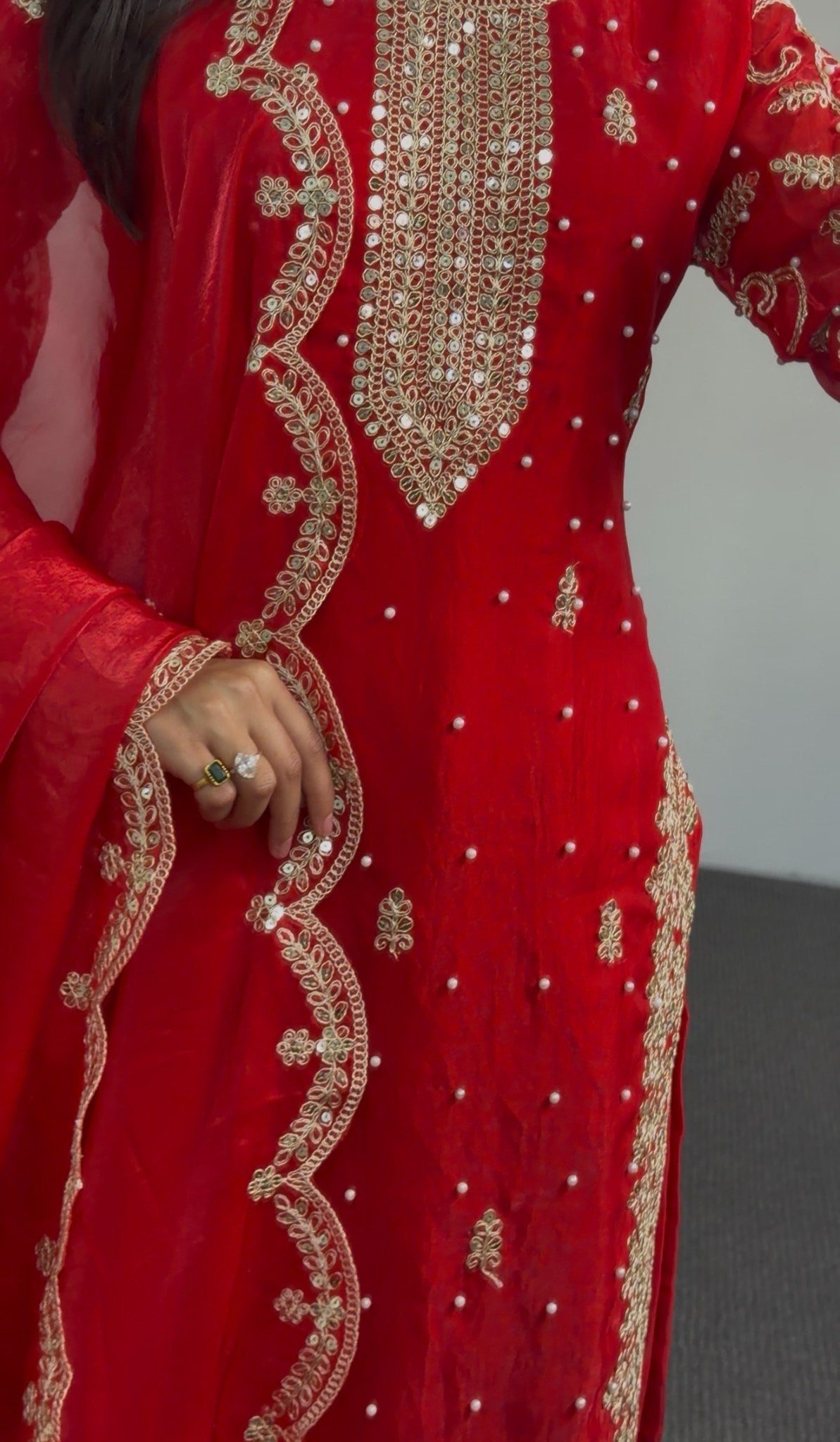 Crimson red georgette palazzo suit set with gold zari embroidery, kundan neckline and matching scalloped dupatta — Behuli — view 6
