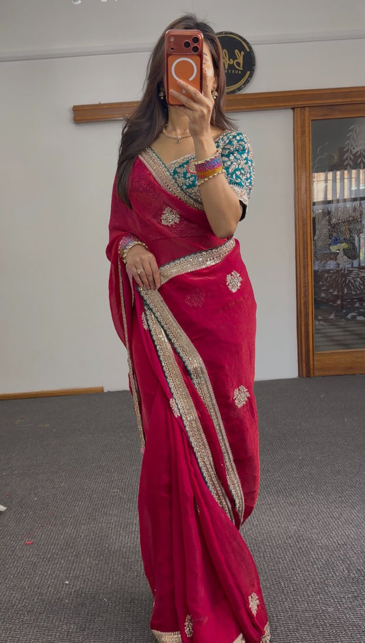 Crimson raw silk saree with silver zari floral buti embroidery, gota-patti border and teal embroidered blouse — Behuli