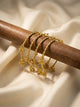 Gold-Tone Twisted Rope Bangles Set with Floral Ghungroo Charms