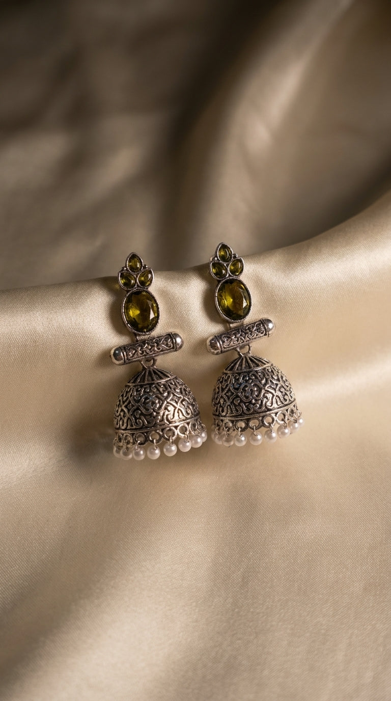 Oxidised silver jhumka earrings with aqua cabochon stones, filigree dome and ivory pearl drops on gold silk — Behuli — Dark Yellow