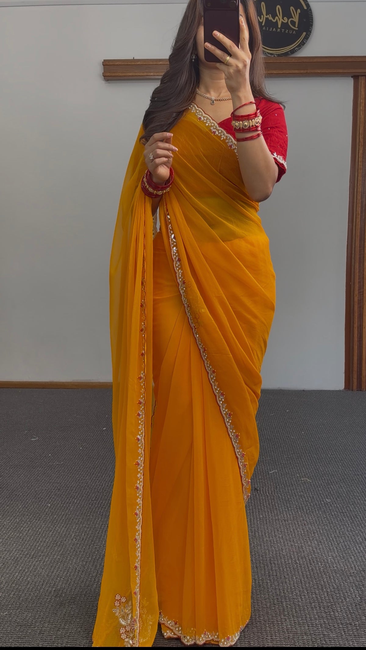 Mustard Yellow Georgette Saree with Red Blouse & Pearl Border