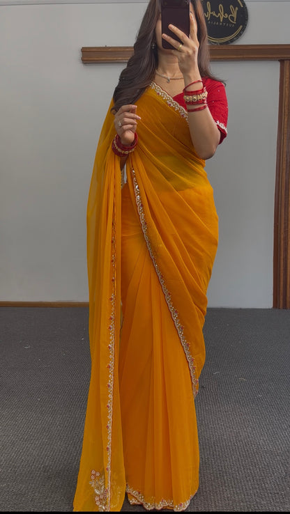 Mustard Yellow Georgette Saree with Red Blouse & Pearl Border