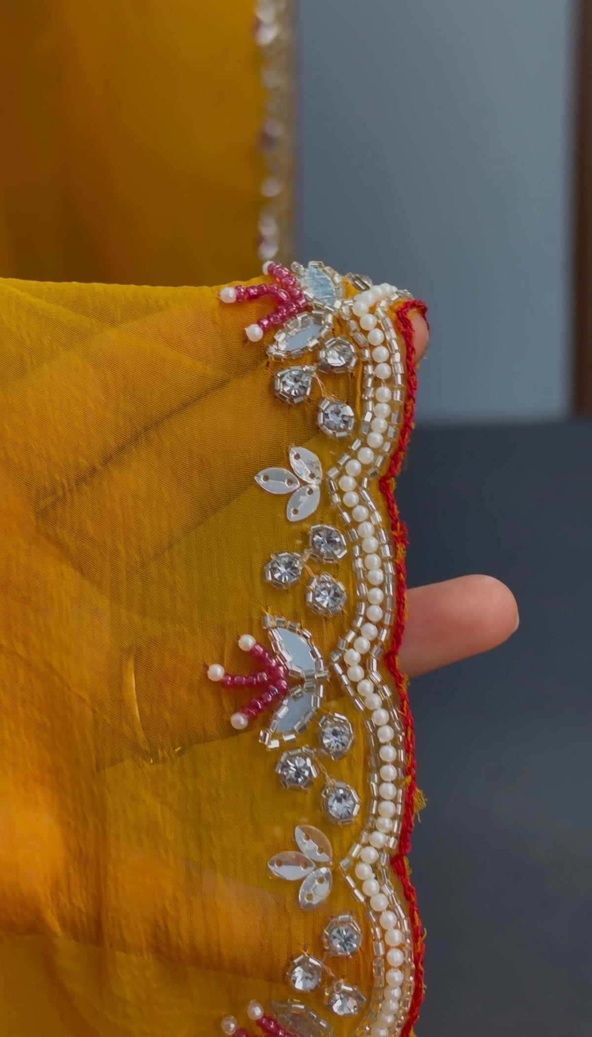 Mustard Yellow Georgette Saree with Red Blouse & Pearl Border