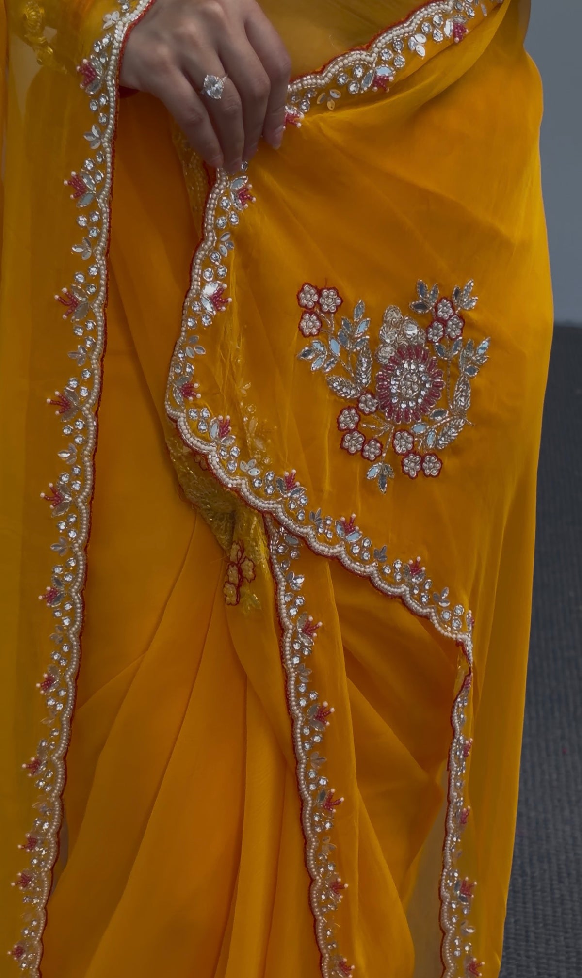 Mustard Yellow Georgette Saree with Red Blouse & Pearl Border