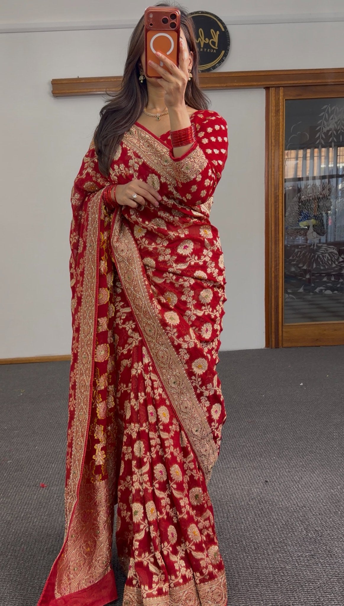 Deep red Khaddi Georgette saree with all-over gold zari floral jaal embroidery and matching full-sleeve blouse — Behuli
