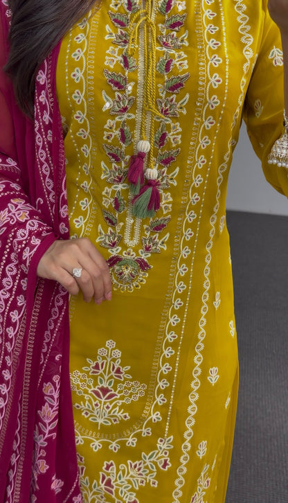 Mustard yellow kurti set with floral embroidery, tassel neckline detail and fuchsia pink embroidered dupatta — Behuli — view 2