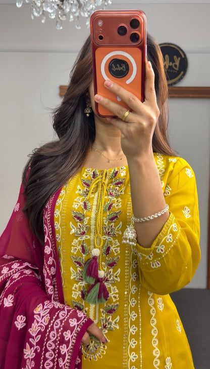 Mustard yellow kurti set with floral embroidery, tassel neckline detail and fuchsia pink embroidered dupatta — Behuli — view 4