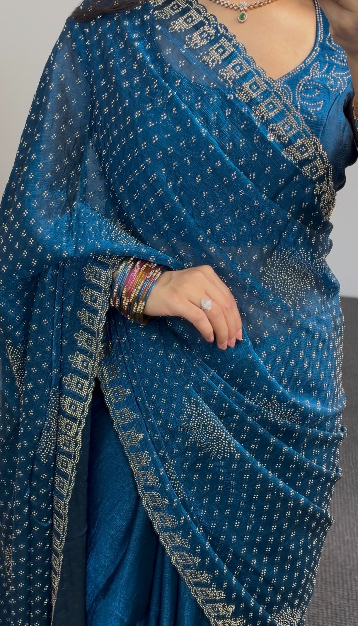Teal bandhani print saree with sequin embroidery and embellished border draped elegantly — Behuli Australia — view 4