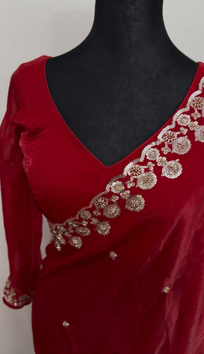 Red saree with silver sequin floral embroidery on border and pallu, draped with matching full-sleeve blouse — view 5