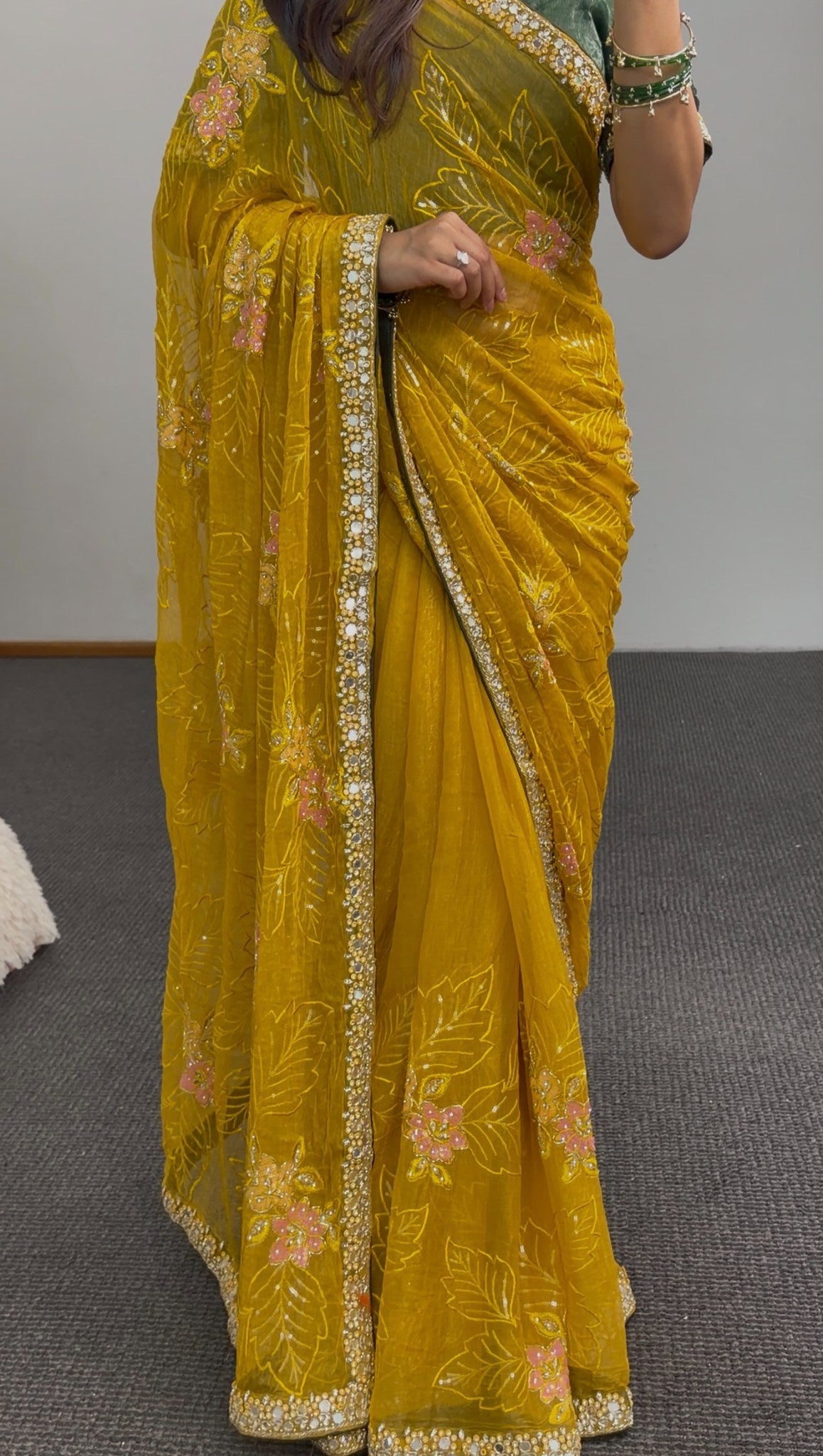 Mustard yellow saree with floral embroidery and sequin border worn with a green embellished blouse — Behuli Australia — view 4