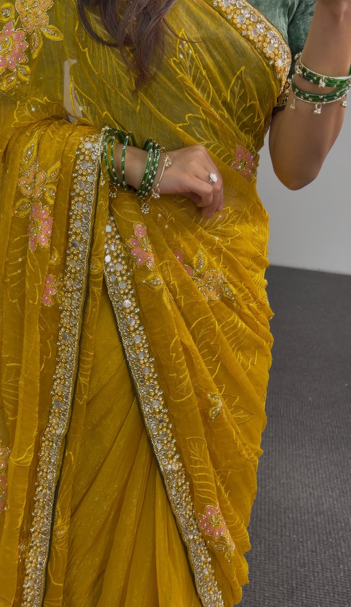 Mustard yellow saree with floral embroidery and sequin border worn with a green embellished blouse — Behuli Australia — view 5