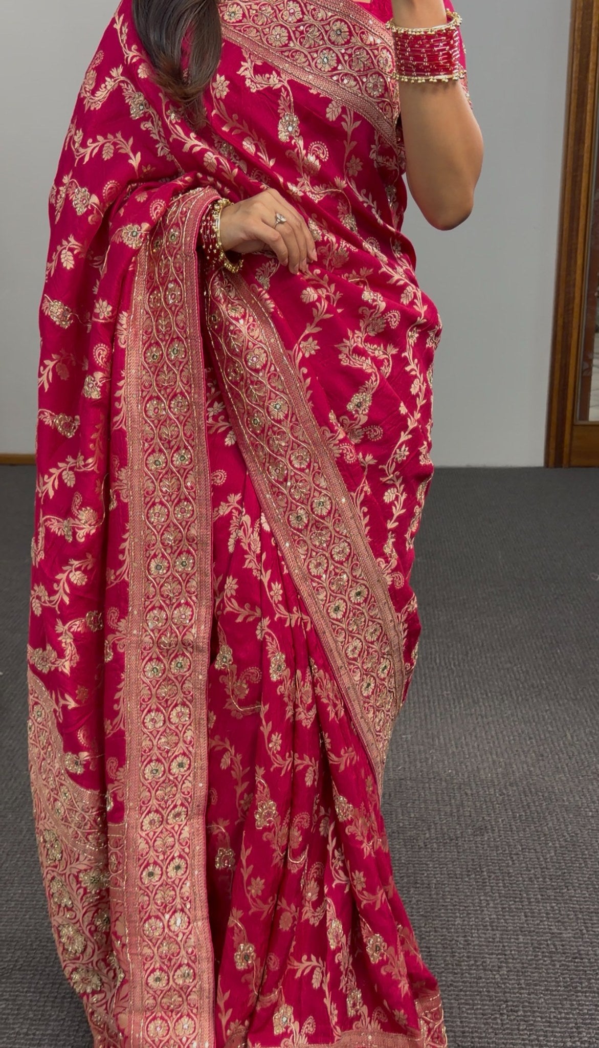 Magenta khaddi georgette saree with gold zari floral embroidery and embellished border worn with matching blouse — view 2