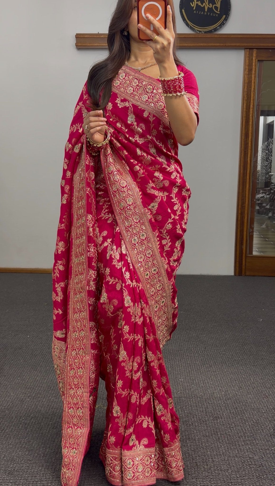 Magenta khaddi georgette saree with gold zari floral embroidery and embellished border worn with matching blouse — view 5