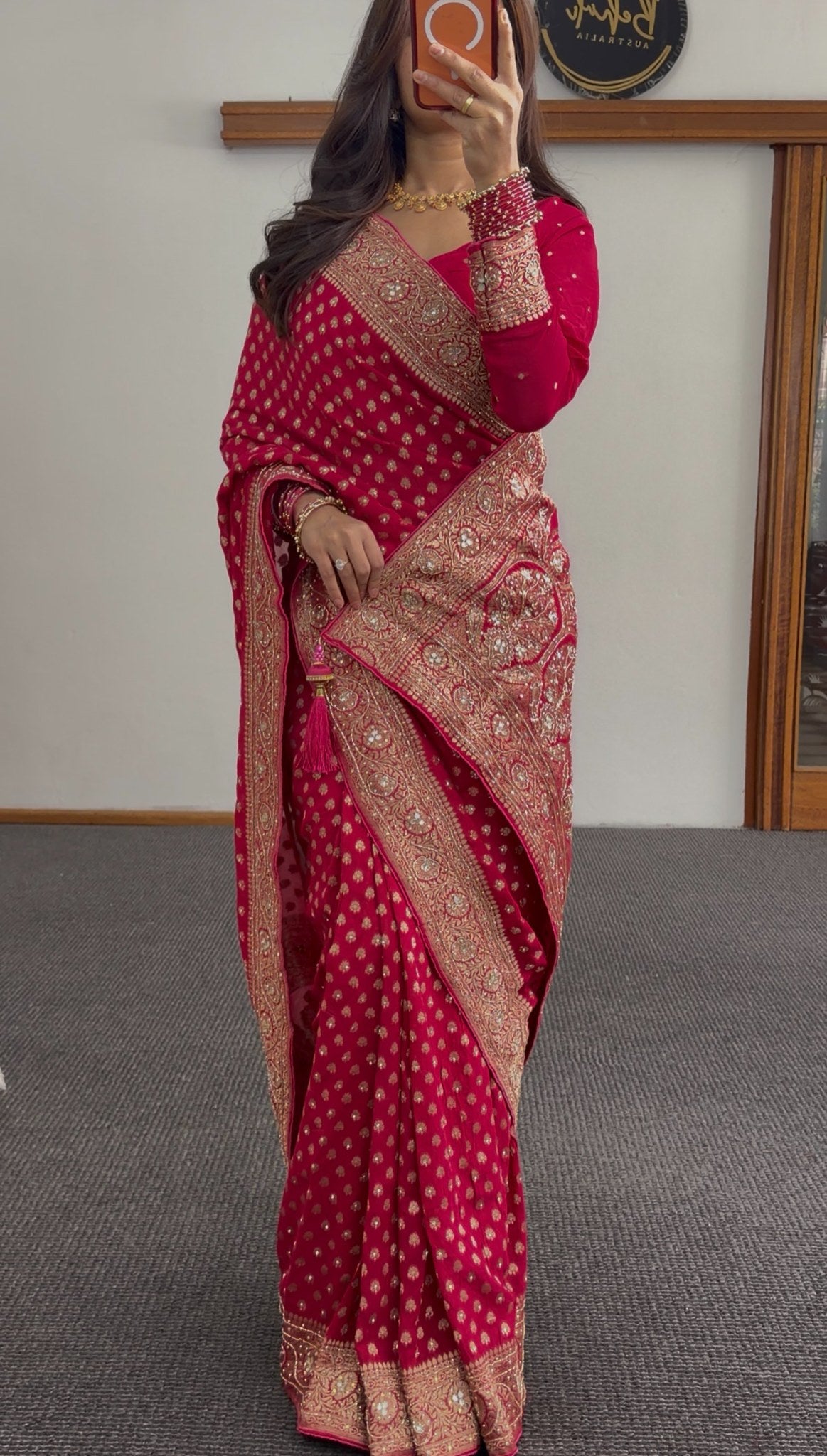 Rani pink khaddi georgette saree with gold zari butis and embellished border draped with matching blouse — view 2