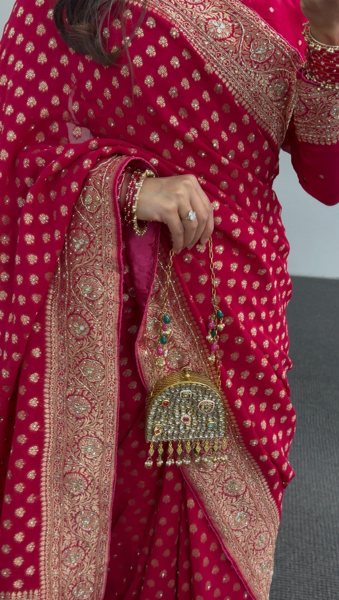 Rani pink khaddi georgette saree with gold zari butis and embellished border draped with matching blouse — view 3