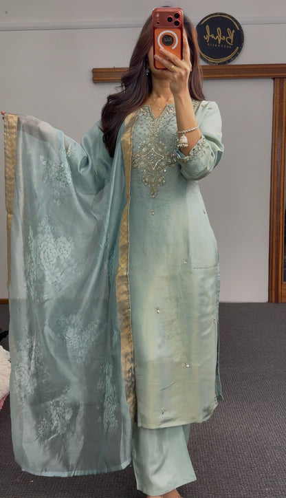 Sage green kurti set with embellished neckline, gold-bordered floral dupatta and matching palazzo pants
