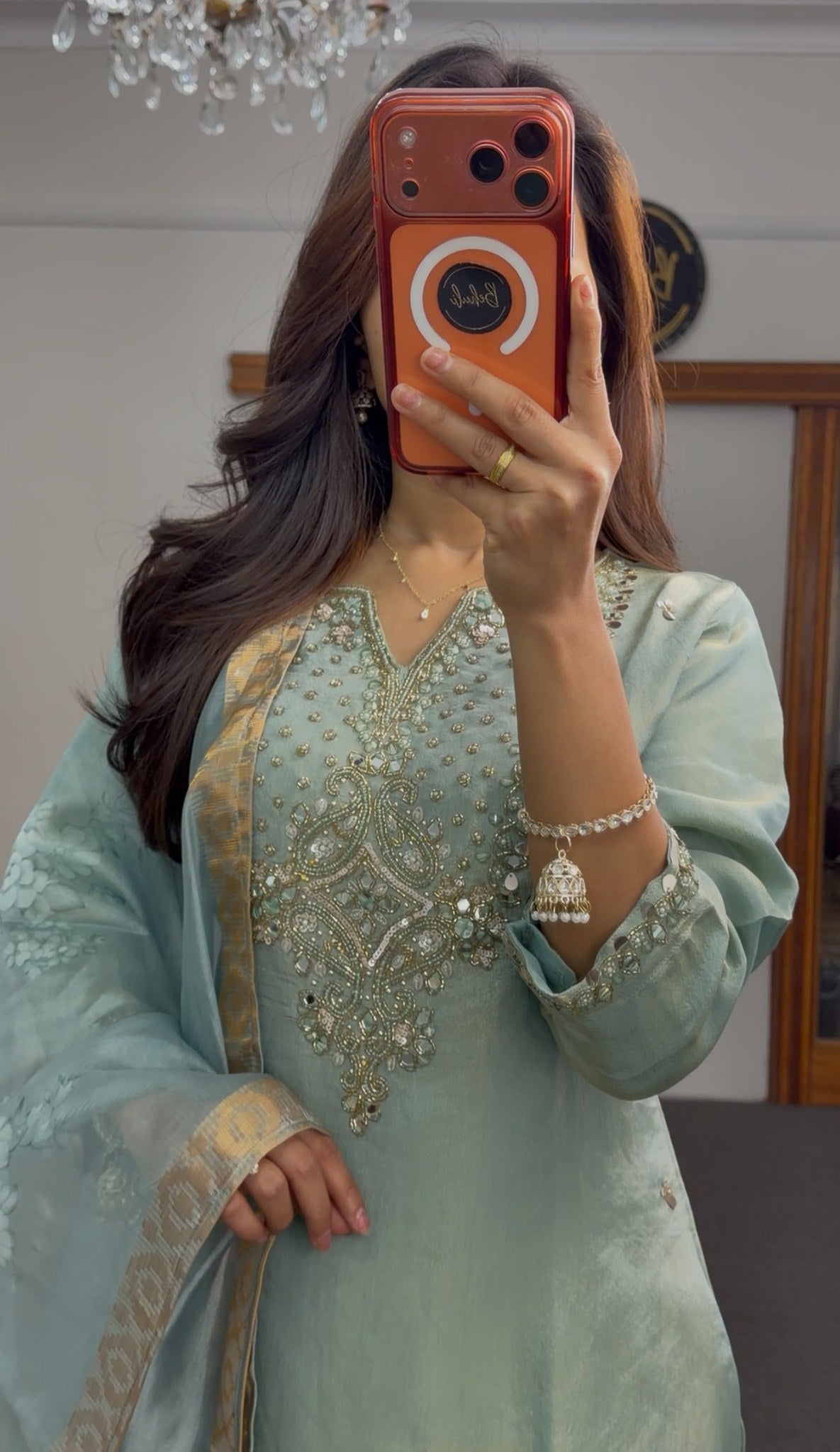 Sage green kurti set with embellished neckline, gold-bordered floral dupatta and matching palazzo pants — view 2