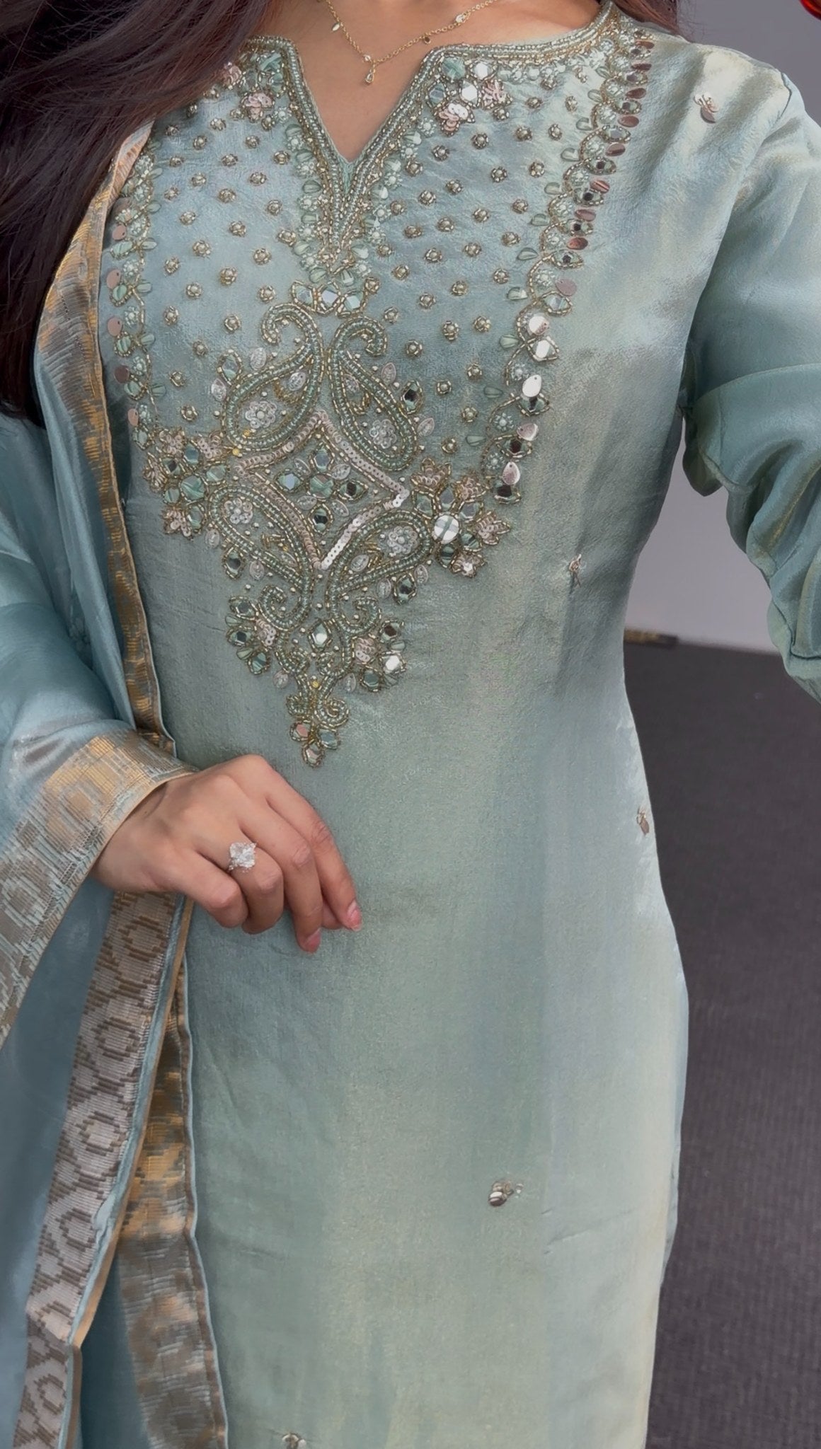 Sage green kurti set with embellished neckline, gold-bordered floral dupatta and matching palazzo pants — view 3