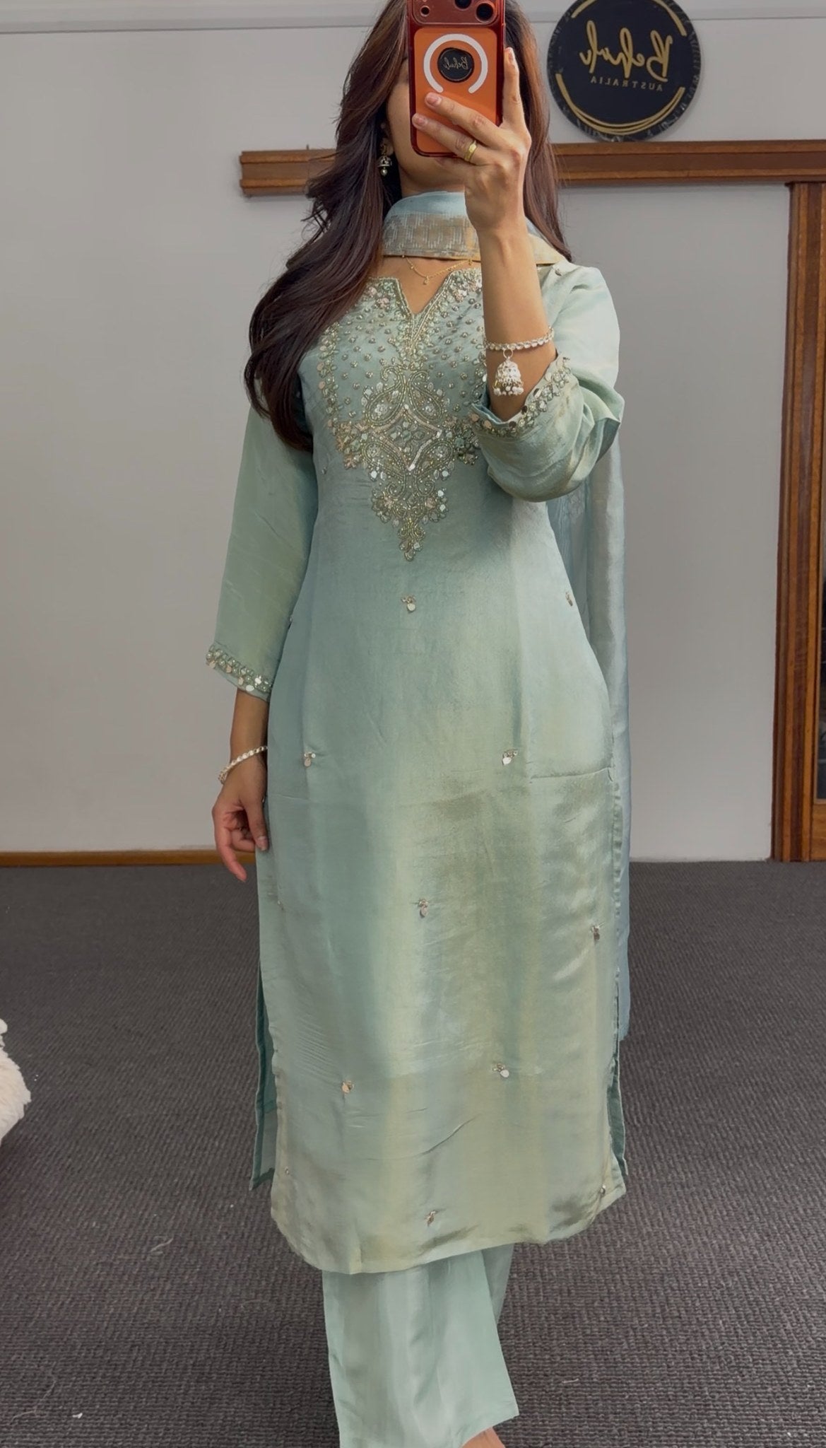 Sage green kurti set with embellished neckline, gold-bordered floral dupatta and matching palazzo pants — view 5