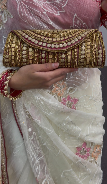 Maroon embroidered clutch bag with gold beadwork and stone work detailing in arched pattern design — view 2