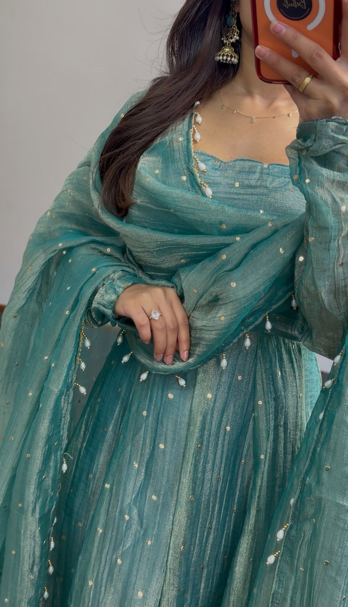 Teal Anarkali gown with scattered sequin detailing, puffed sleeves, and matching beaded-edge dupatta draped over the arm — view 3